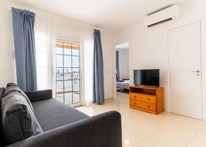 Апартаменты Casitas De