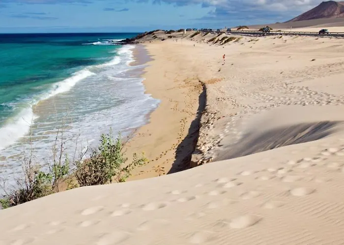 Casitas De Коральео